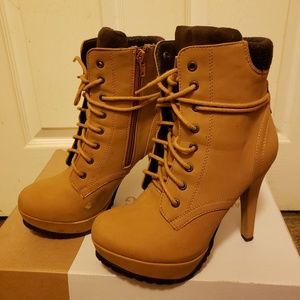 Call it spring tan laced booties